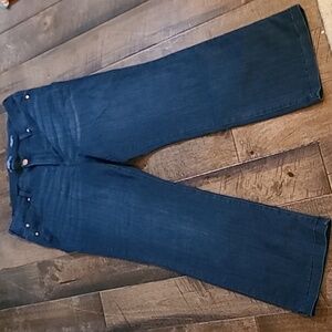 Mid rise slim boot dark blue jeans